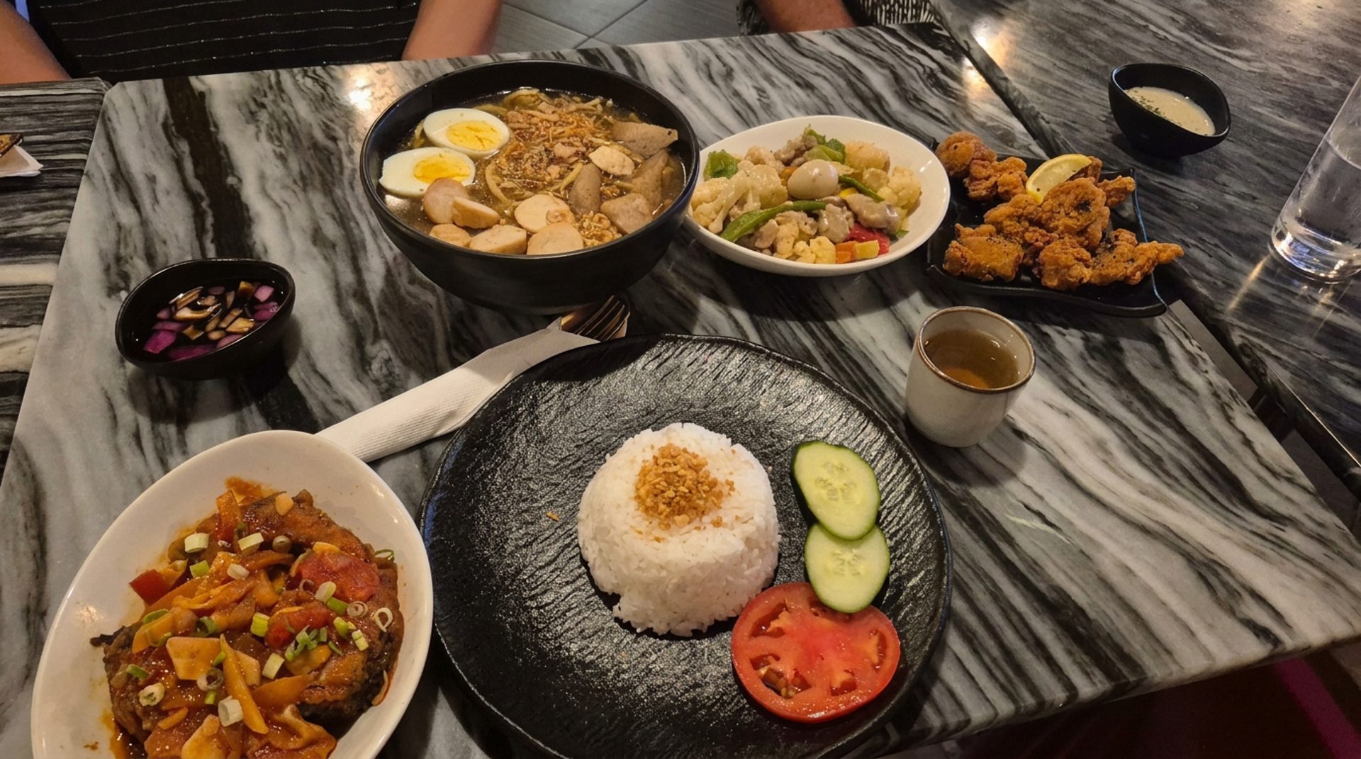 A tableful of Filipino dishes